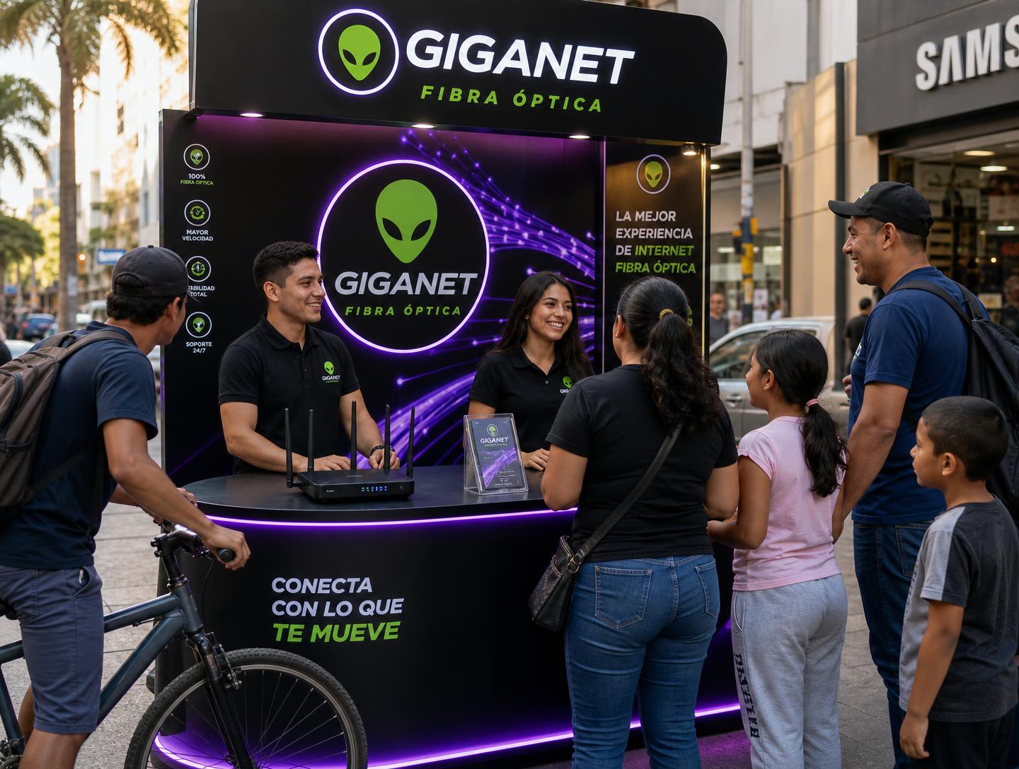 Stand de GIGANET con promotores atendiendo clientes en una calle
